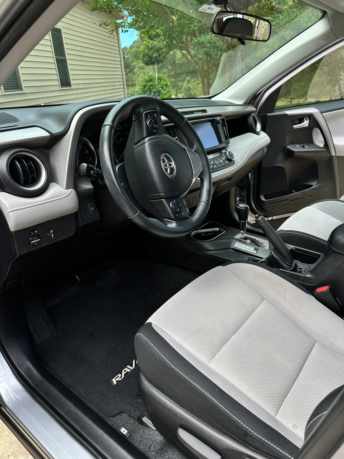 Silver SUV interior overhead view after detail — clean headliner and seats
