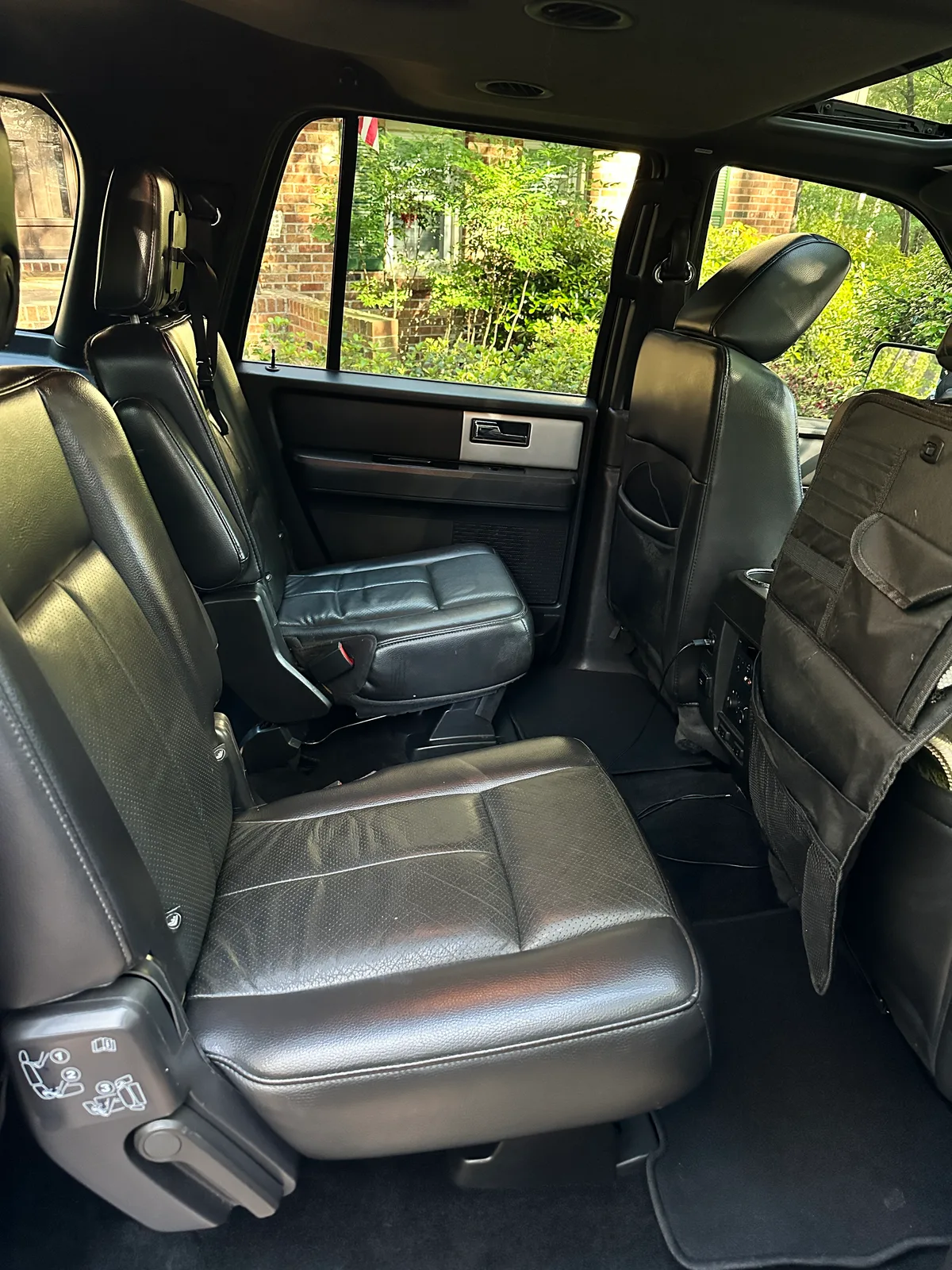 Ford truck center console area after detail — spotless cup holders and shift area