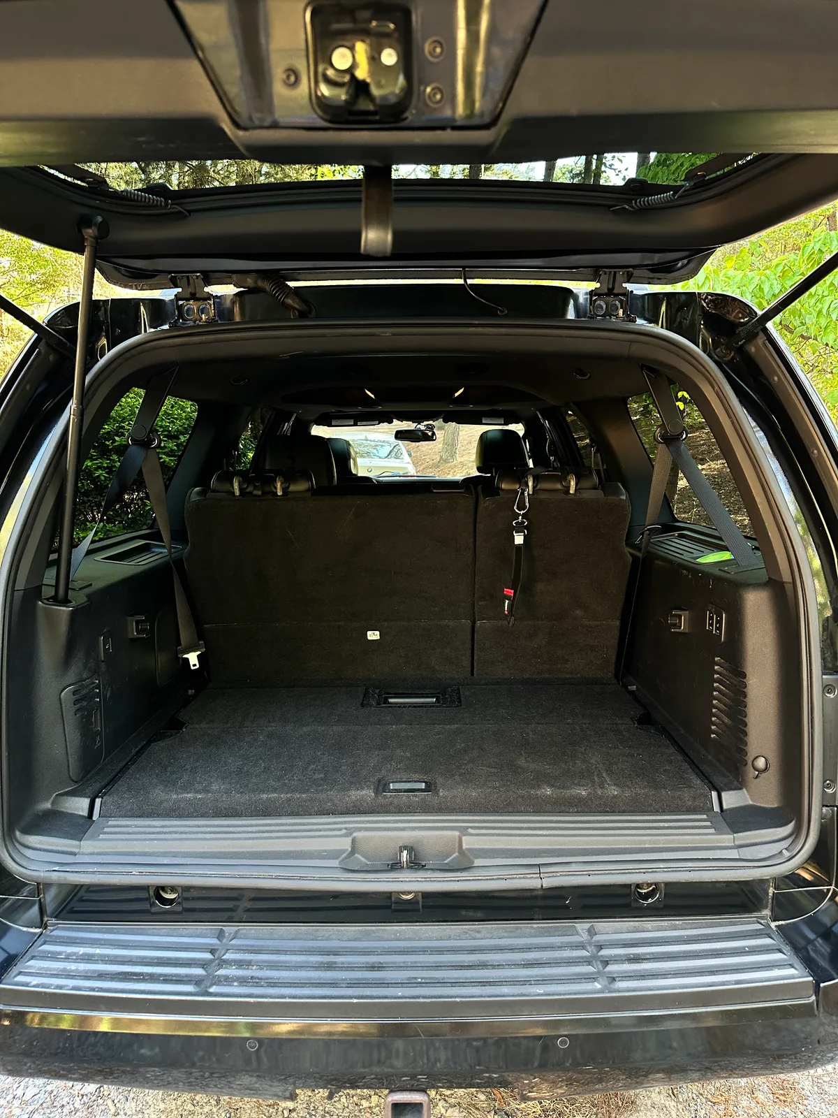 Ford floor mat after interior detail — spotless Ford logo rubber mat