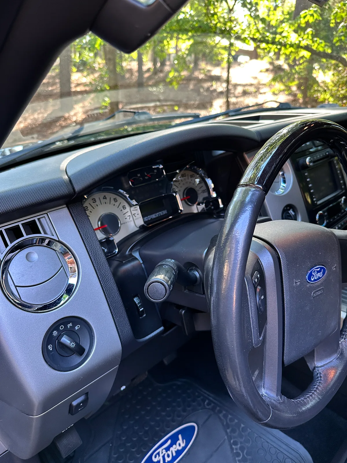 Ford truck cargo area after detail — deep cleaned bed liner and floor