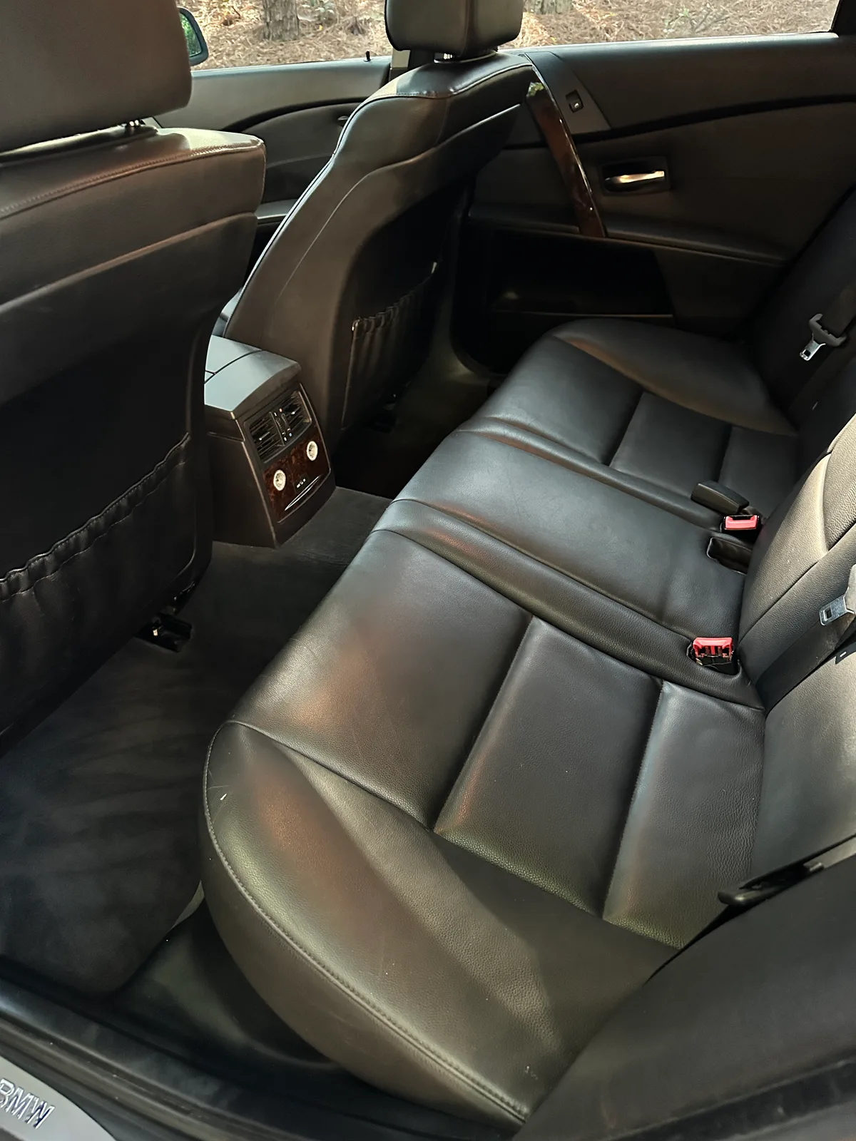 Ford truck front seat after detail — spotless black leather driver seat Pinehurst NC