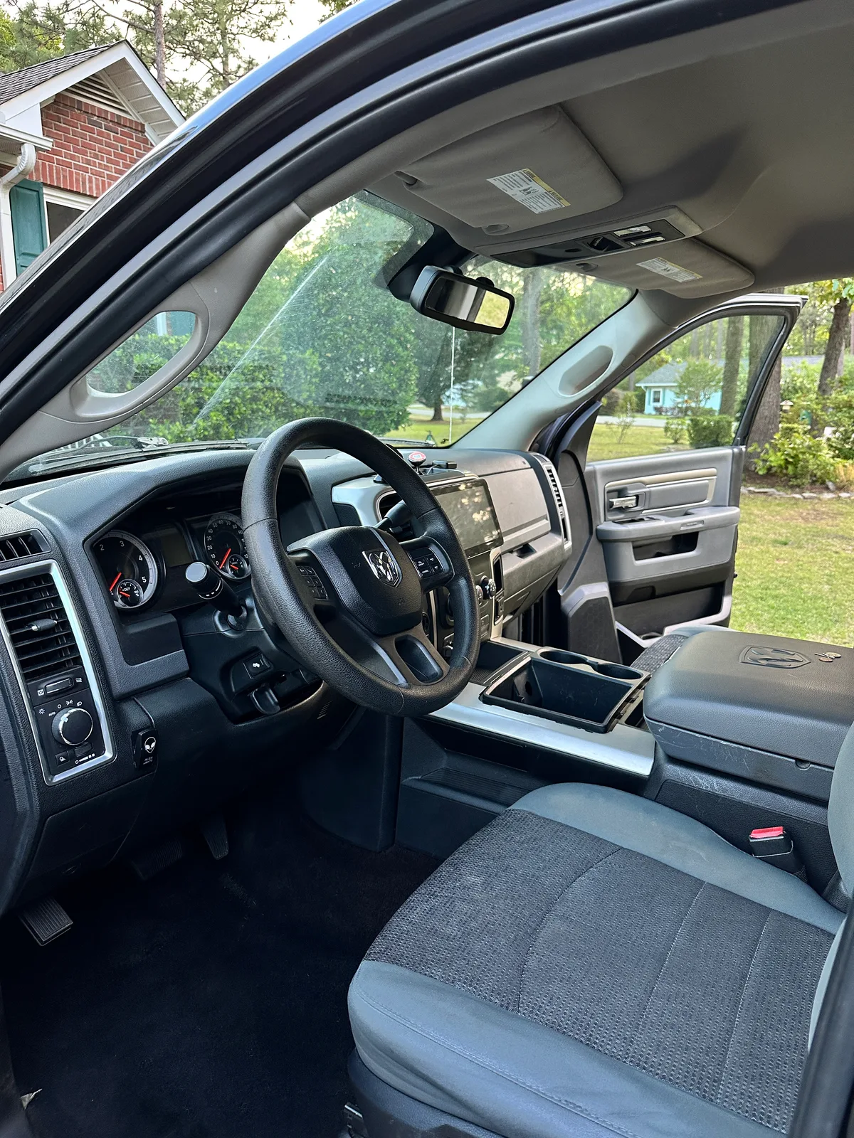 Ram truck cab interior after detail — clean steering wheel and dashboard Pinehurst NC