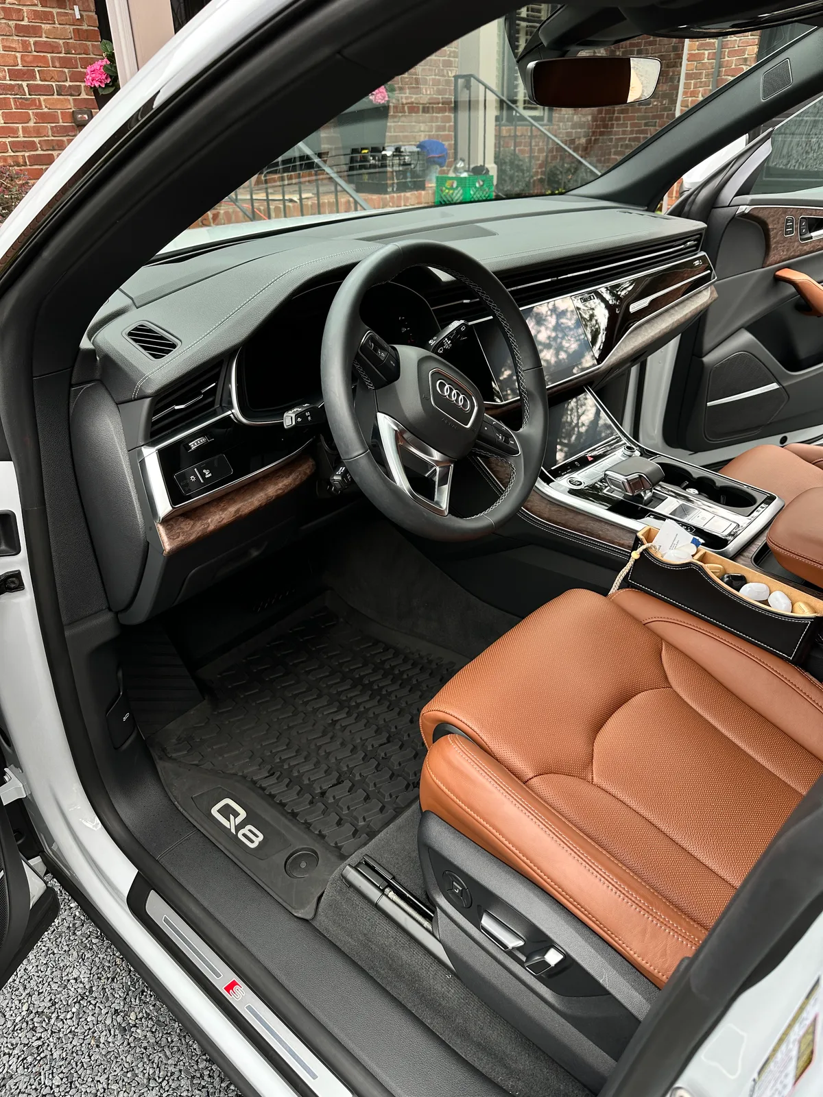 White luxury SUV third row after Back Nine detail — spotless tan leather seats