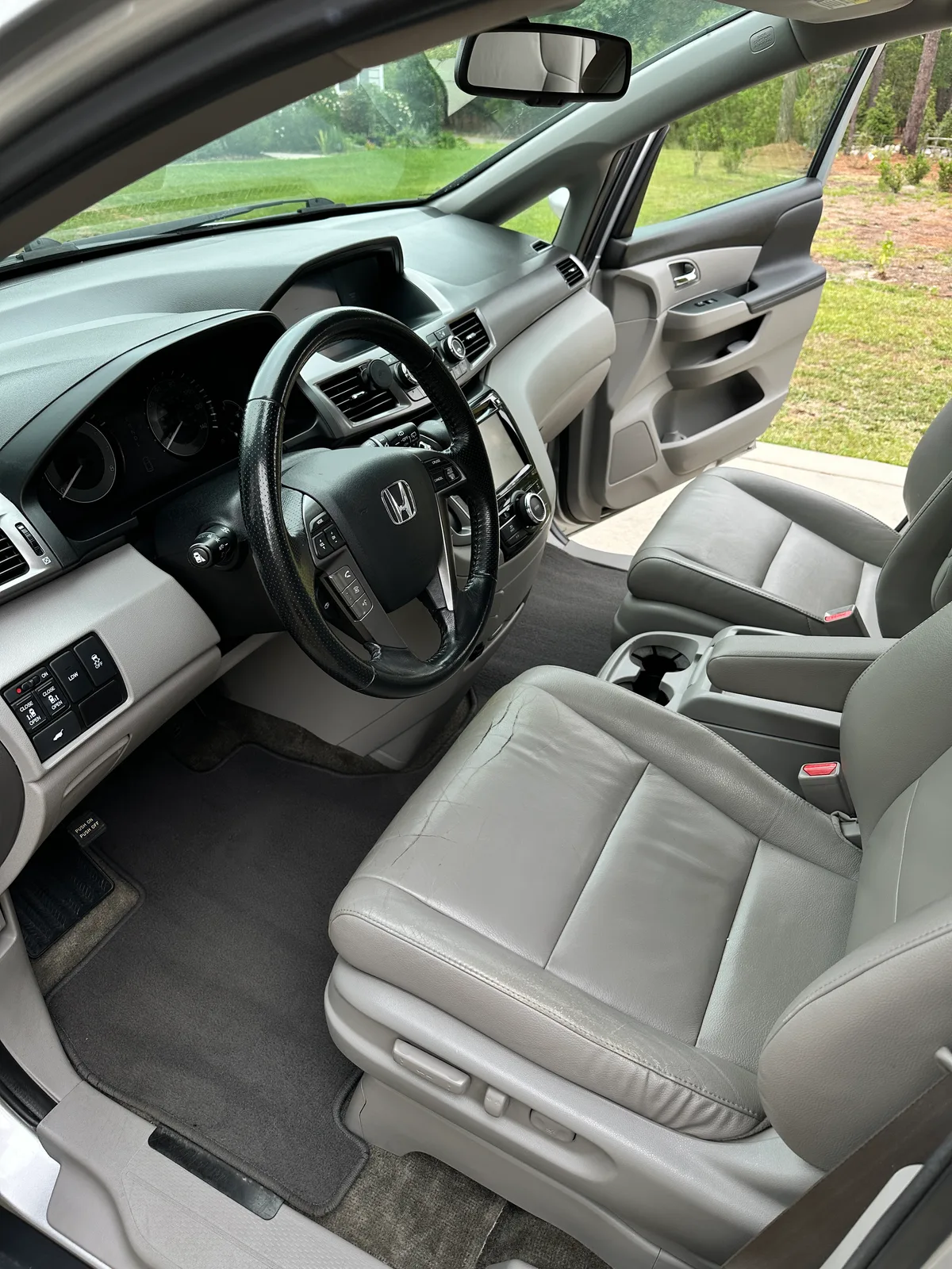 Honda interior after detail — clean gray leather seats Pinehurst NC