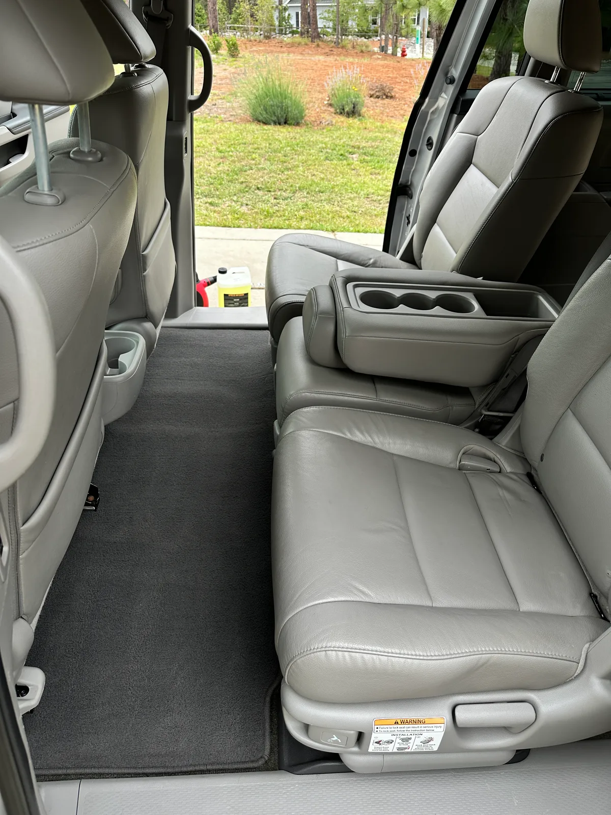 Honda interior after detail — clean dashboard and door panel
