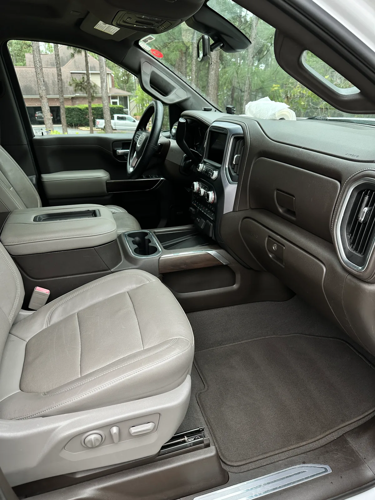 Honda interior after detail — clean rear seat area and door panel