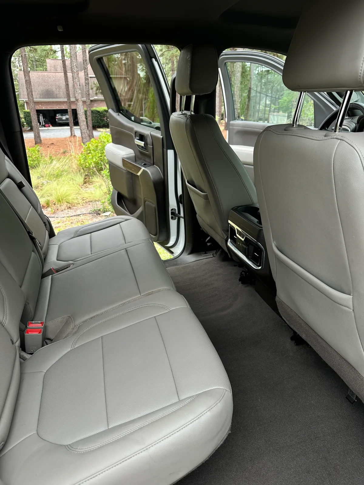 Honda interior after detail — spotless cargo area and rear glass