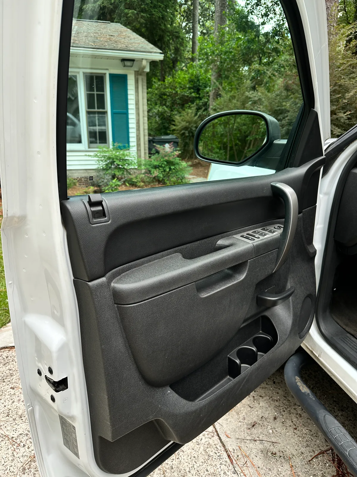 GMC truck interior after detail — clean rear seat and door sill