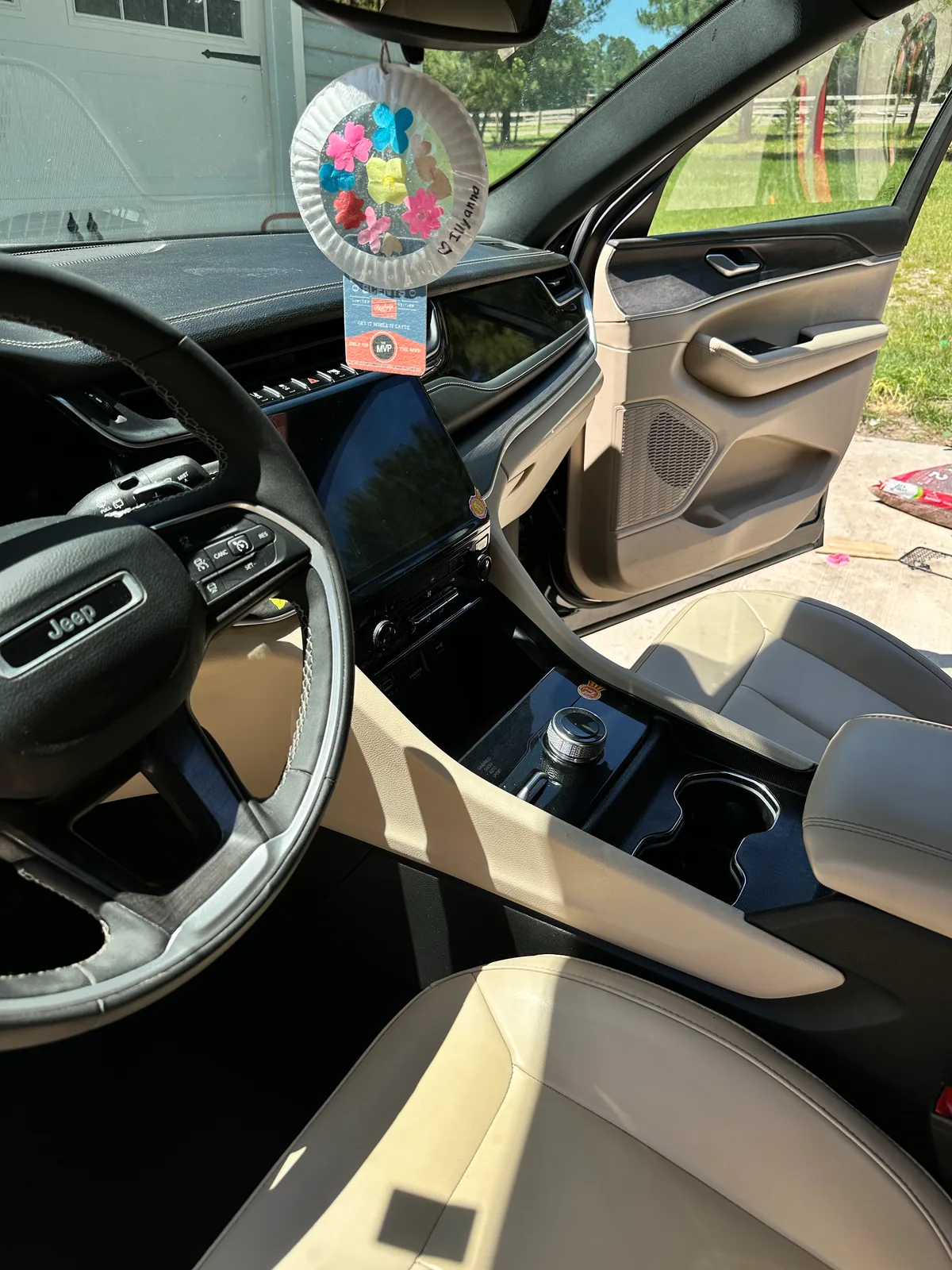 Luxury SUV interior after Full Round detail — spotless cream leather throughout